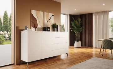 Sideboard in weiß mit schwarzen Design-Füßen in einem Raumsznario
