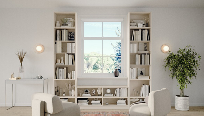 Ein Bücherregal kann mit unterschiedlichen Höhen auch rund um das Fenster geplant werden.