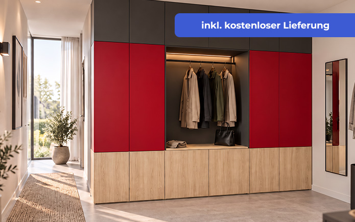 Milieubild eines Garderobenschranks. Dargestellt in Schwarz, Rot, Gold. Obere Reihe der geschlossenen Elemente in schwarz. Links und rechts die Schrankelemente in rot und die untere Reihe an Elementen in Eiche Natur (Nachbildung). In Szene gesetzt in einem hellen Flur mit bodentiefem Fenster links im Gang.